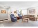Inviting living room with comfortable seating, natural light, and neutral tones at 5525 E Thomas Rd # N5, Phoenix, AZ 85018