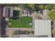 This lovely backyard includes a firepit, well-manicured lawn, covered patio, outdoor workout area, and plenty of seating at 560 S 197Th Ave, Buckeye, AZ 85326