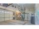 Spacious garage with ample storage, work bench, and bike storage at 560 S 197Th Ave, Buckeye, AZ 85326