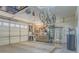 Well-organized garage with overhead storage and a large work area at 560 S 197Th Ave, Buckeye, AZ 85326