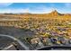 Panoramic aerial view of a residential area, showcasing mountain views and neighborhood layout at 6022 W Fetlock Trl, Phoenix, AZ 85083