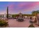 Picturesque backyard featuring an outdoor kitchen and a mountain view at 6022 W Fetlock Trl, Phoenix, AZ 85083