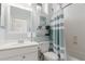 Cozy bathroom featuring a vanity, a toilet, and a shower behind a blue curtain at 6022 W Fetlock Trl, Phoenix, AZ 85083