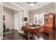 Spacious home office featuring dark wood floors, french doors, and ample natural light at 6022 W Fetlock Trl, Phoenix, AZ 85083