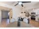 Bright kitchen and dining area featuring stainless steel appliances and modern pendant lighting at 6565 N 19Th Ave # 59, Phoenix, AZ 85015