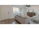 Comfortable living room featuring stylish furniture, wood-look floors, and ample natural light at 6565 N 19Th Ave # 59, Phoenix, AZ 85015