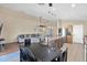 Inviting living area and kitchen with stainless steel appliances, a dining table, and view into the living room at 6904 W Golden Ln, Peoria, AZ 85345