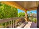 Enjoy serene views from this balcony overlooking lush greenery and desert landscape at 7330 E Palo Verde Dr # 1, Scottsdale, AZ 85250