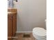 Compact bathroom with toilet, vanity, and tile flooring at 7807 E Main St # E-38, Mesa, AZ 85207