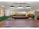 Spacious billiard room featuring multiple pool tables and comfortable seating at 7807 E Main St # E-38, Mesa, AZ 85207
