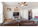 Comfortable living room with entertainment setup and natural light at 7807 E Main St # E-38, Mesa, AZ 85207