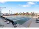 Multiple shuffleboard courts with benches and covered seating areas in a community setting at 7807 E Main St # E-38, Mesa, AZ 85207