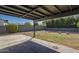 Brick patio overlooks the landscaped backyard with privacy wall at 801 E Piute Ave, Phoenix, AZ 85024