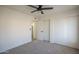 This bedroom offers carpet and large closets with sliding doors at 801 E Piute Ave, Phoenix, AZ 85024