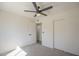 Neutral paint, carpet, and closet with sliding doors in this bedroom at 801 E Piute Ave, Phoenix, AZ 85024