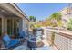 Backyard featuring a fire pit, built-in kitchen, and mature landscaping at 816 E Amberwood Dr, Phoenix, AZ 85048