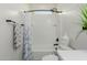 White shower-over-tub and vanity with decorative plant at 816 E Amberwood Dr, Phoenix, AZ 85048