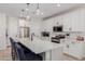 Bright kitchen featuring a center island, stainless steel appliances, and shaker cabinets at 816 E Amberwood Dr, Phoenix, AZ 85048