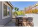 Built-in kitchen with stone details and bar seating at 816 E Amberwood Dr, Phoenix, AZ 85048