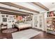 Bright bedroom with hardwood floors, exposed beams, and french doors at 825 W 12Th St, Tempe, AZ 85281