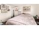 Bedroom with hardwood floors, natural light, and cozy decor creating a peaceful and inviting space at 825 W 12Th St, Tempe, AZ 85281