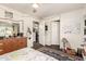 Bedroom with hardwood floors, and open door, offering a cozy retreat at 825 W 12Th St, Tempe, AZ 85281