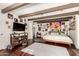 Comfortable bedroom featuring hardwood floors, exposed beams, and stylish decor at 825 W 12Th St, Tempe, AZ 85281