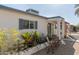 Inviting front entrance with a cozy patio area and desert landscaping for easy maintenance at 825 W 12Th St, Tempe, AZ 85281