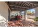 Covered patio with outdoor seating, ideal for relaxing and entertaining guests at 825 W 12Th St, Tempe, AZ 85281