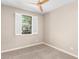 Bedroom with carpeted floor and a ceiling fan at 8515 W Peppertree Ln, Glendale, AZ 85305