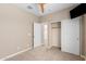 Bedroom featuring a closet and carpeted floors at 8515 W Peppertree Ln, Glendale, AZ 85305