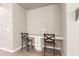 Home office featuring a built-in desk with seating at 8515 W Peppertree Ln, Glendale, AZ 85305