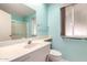 Bright bathroom features a single sink vanity and shower over tub at 10420 W Tropicana Cir, Sun City, AZ 85351