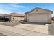 A single story home with a two car garage and low maintenance landscaping at 10515 W Pasadena Ave, Glendale, AZ 85307