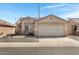 Charming single-story home with a well-maintained yard and a two-car garage at 10515 W Pasadena Ave, Glendale, AZ 85307