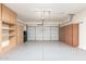 Spacious garage with built-in cabinets along the walls, providing ample storage at 12603 W Blackstone Ln, Peoria, AZ 85383