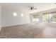 View of a large living room with neutral color scheme at 12603 W Blackstone Ln, Peoria, AZ 85383