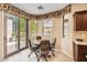 Bright breakfast nook with sliding glass doors to outdoor living at 13055 W Cliffrose Rd, Peoria, AZ 85383