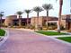 Beautiful building exterior featuring stone and palm trees and a paved entrance at 13055 W Cliffrose Rd, Peoria, AZ 85383