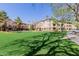 Exterior view of condo building with green lawn at 14950 W Mountain View Blvd # 5107, Surprise, AZ 85374