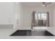 Modern kitchen featuring stainless steel sink, neutral countertops, and natural light at 14950 W Mountain View Blvd # 5107, Surprise, AZ 85374