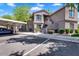 Inviting exterior view of home with covered parking, desert landscaping, and well-maintained stucco at 15252 N 100Th St # 2141, Scottsdale, AZ 85260