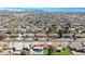 An aerial view of the neighborhood shows single-Gathering homes and clear, blue skies at 1604 W Kerry Ln, Phoenix, AZ 85027