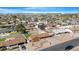 An aerial view of the neighborhood shows single-Gathering homes and clear, blue skies at 1604 W Kerry Ln, Phoenix, AZ 85027