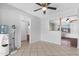 Open dining space with tile flooring, ceiling fan, and access to other rooms at 1604 W Kerry Ln, Phoenix, AZ 85027