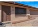 Close-up of the front entrance, showcasing the front door and brick facade at 1604 W Kerry Ln, Phoenix, AZ 85027