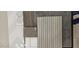 Design scheme featuring tile, grey countertops, wood flooring and textured carpet at 1800 W Caramel Ct, Queen Creek, AZ 85144