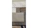 Close up of samples of tile, wood, carpet and countertop materials for a new home construction at 1800 W Caramel Ct, Queen Creek, AZ 85144