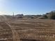 Flat vacant land ready to build with view of desert community with beautiful mountains at 1800 W Caramel Ct, Queen Creek, AZ 85144