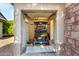 A golf cart parked inside a brightly lit garage with an open door at 19793 N Tapestry Ct, Surprise, AZ 85374